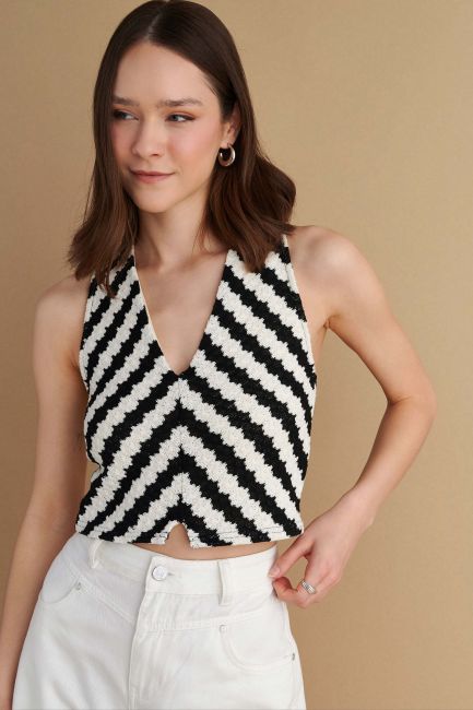 Sleeveless knitted blouse - White